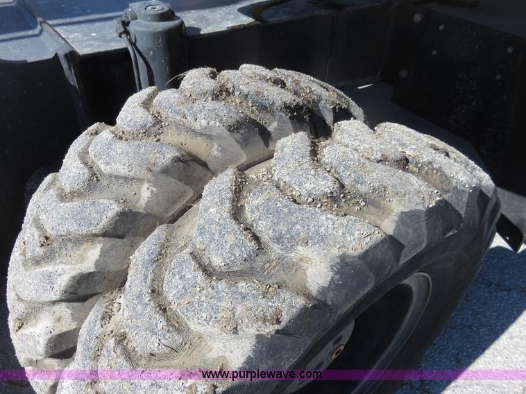 image for item K7107 2001 Caterpillar M315 rubber tire excavator
