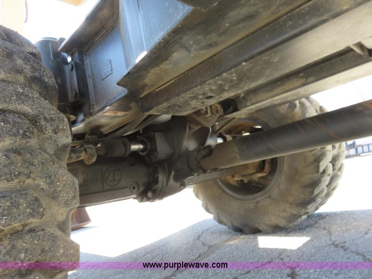 image for item K7107 2001 Caterpillar M315 rubber tire excavator