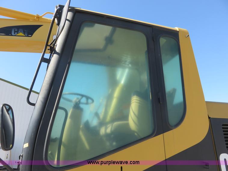 image for item K7107 2001 Caterpillar M315 rubber tire excavator