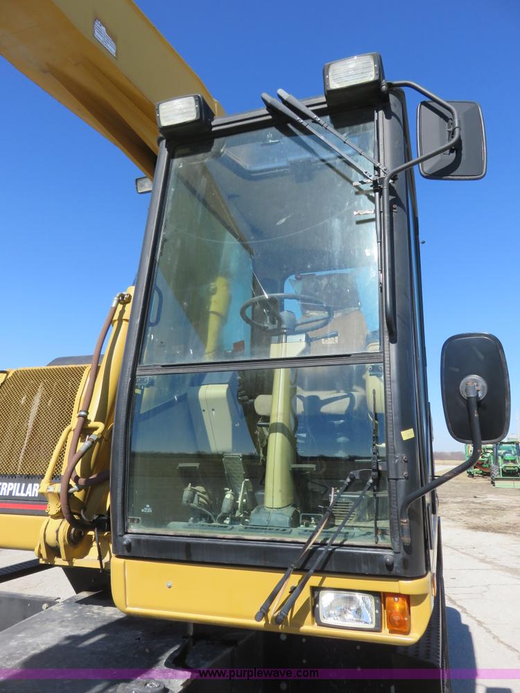 image for item K7107 2001 Caterpillar M315 rubber tire excavator