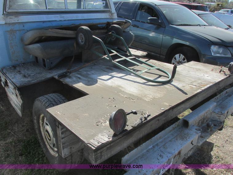 image for item J6709 1976 Chevrolet 1500 flatbed pickup truck