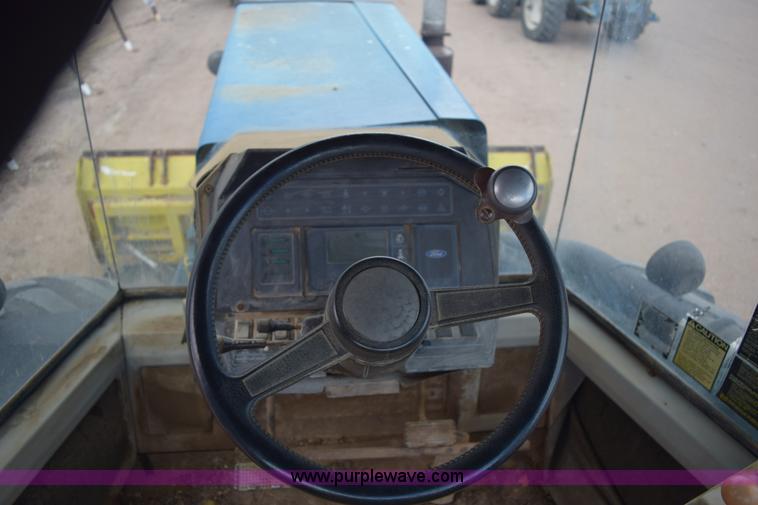 image for item E6189 1991 Ford 876 Versatile Designation 6 4WD tractor