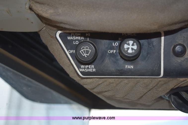 image for item E6189 1991 Ford 876 Versatile Designation 6 4WD tractor