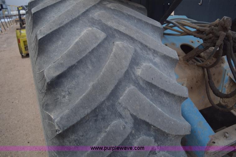 image for item E6189 1991 Ford 876 Versatile Designation 6 4WD tractor