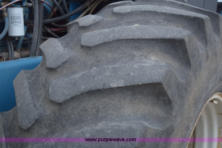 image for item E6189 1991 Ford 876 Versatile Designation 6 4WD tractor