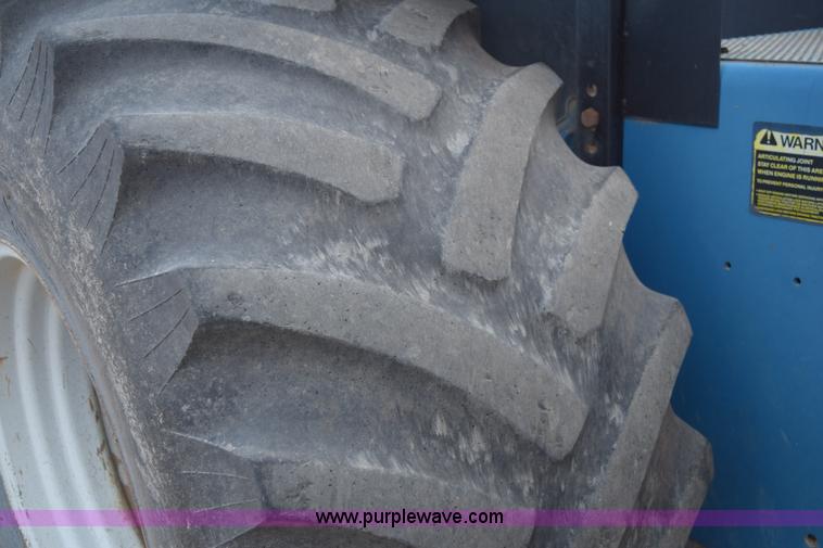 image for item E6189 1991 Ford 876 Versatile Designation 6 4WD tractor