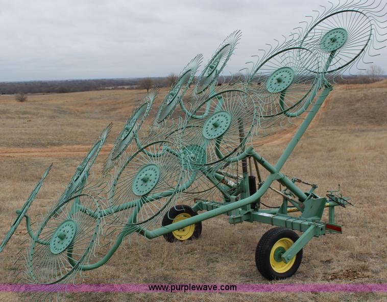 image for item F7567 John Deere 702 10 wheel hay rake