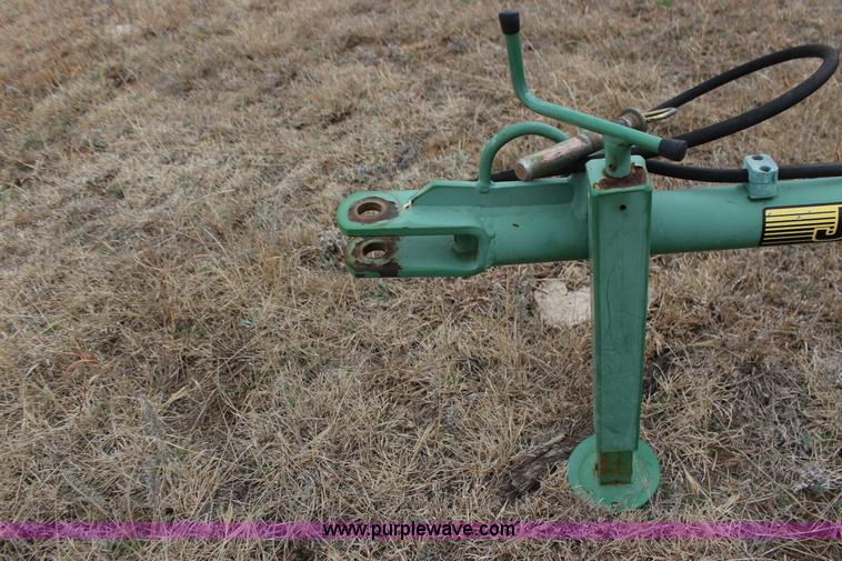 image for item F7567 John Deere 702 10 wheel hay rake