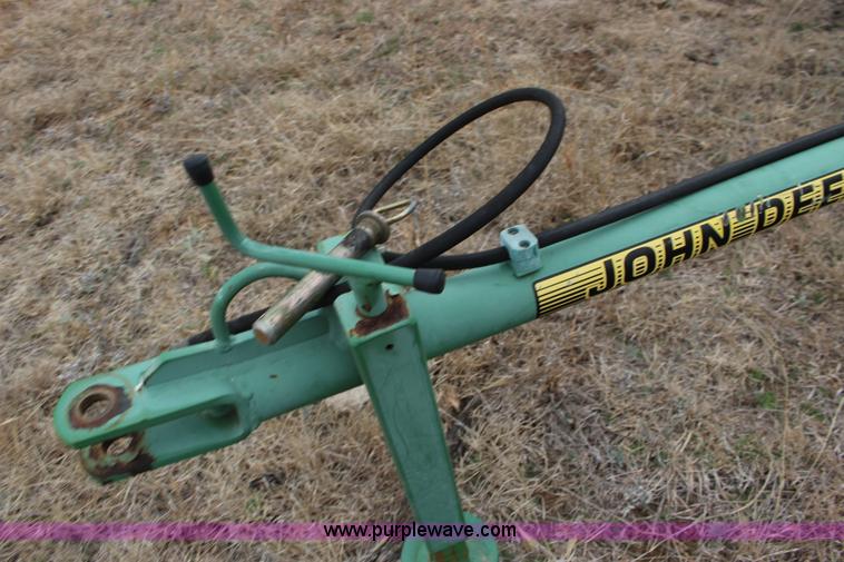 image for item F7567 John Deere 702 10 wheel hay rake