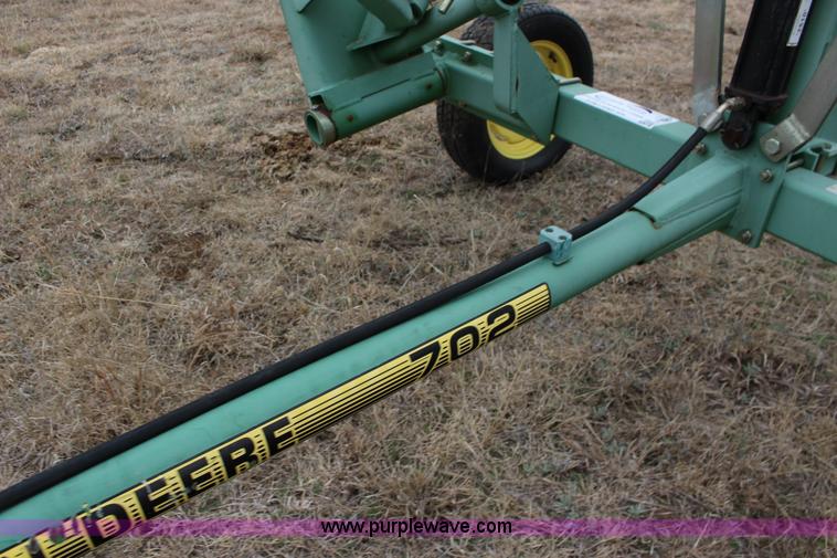 image for item F7567 John Deere 702 10 wheel hay rake