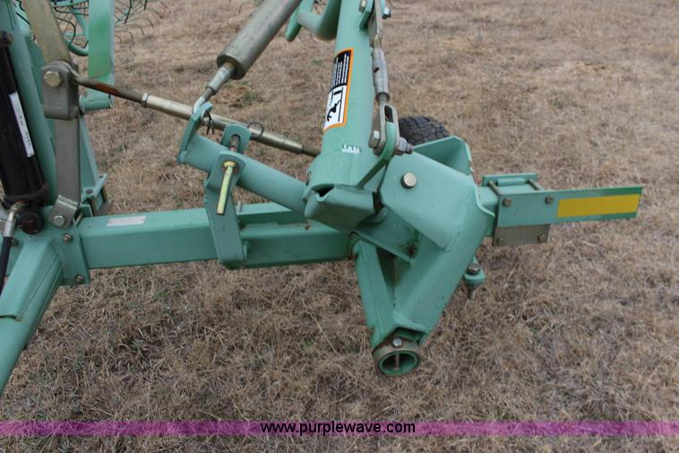 image for item F7567 John Deere 702 10 wheel hay rake