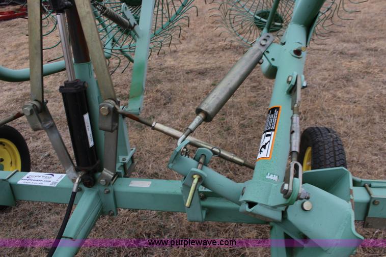 image for item F7567 John Deere 702 10 wheel hay rake