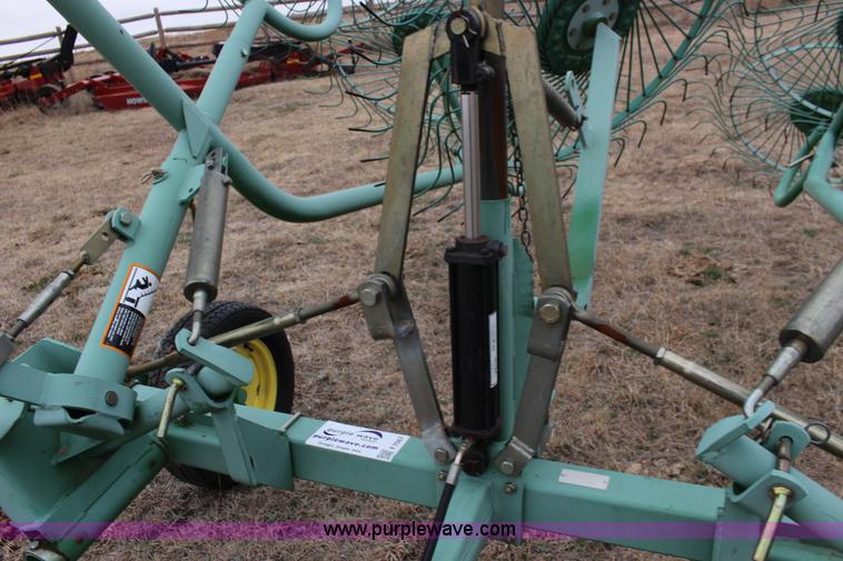 image for item F7567 John Deere 702 10 wheel hay rake