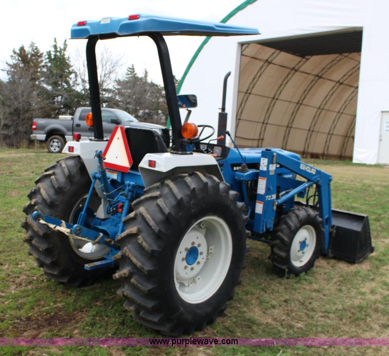 image for item F7608 1998 New Holland 1920 MFWD compact utility tractor