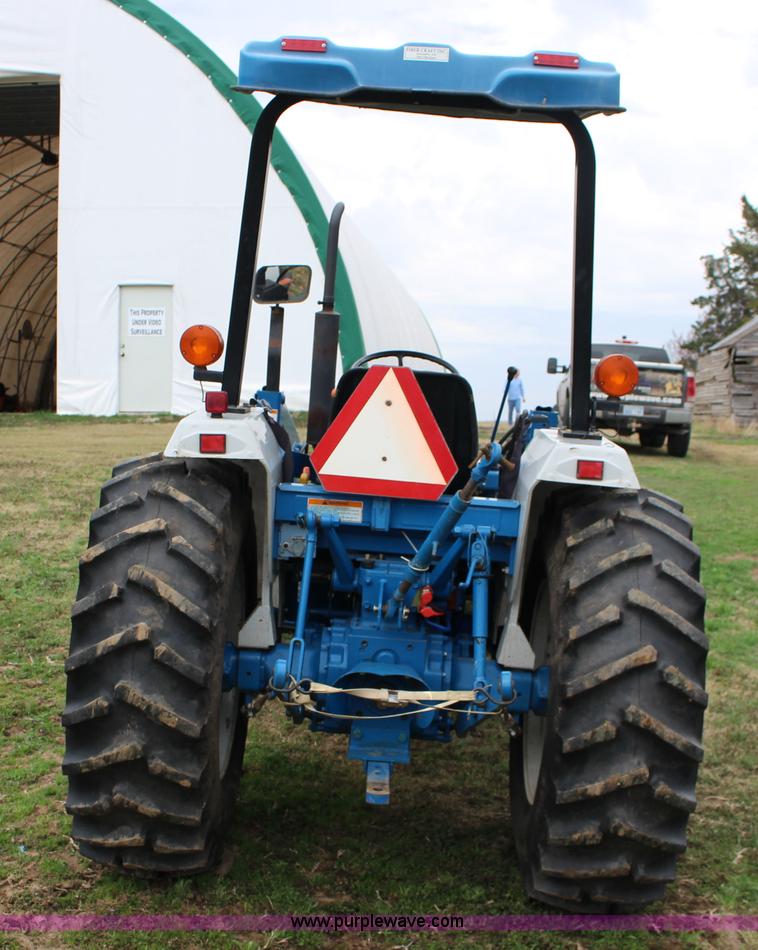 image for item F7608 1998 New Holland 1920 MFWD compact utility tractor