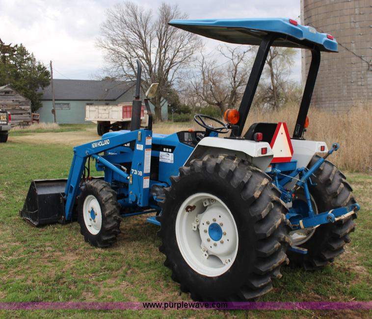 image for item F7608 1998 New Holland 1920 MFWD compact utility tractor