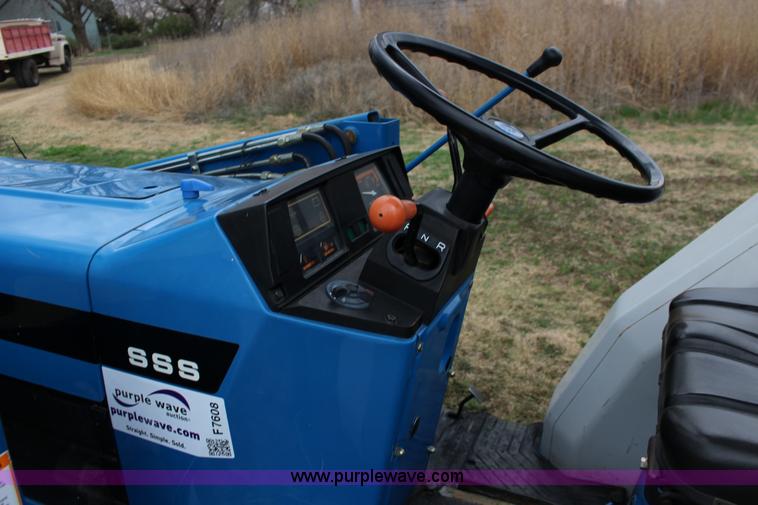 image for item F7608 1998 New Holland 1920 MFWD compact utility tractor