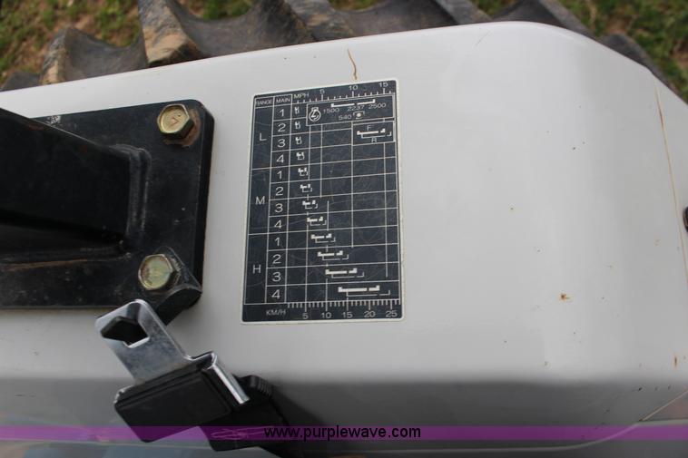 image for item F7608 1998 New Holland 1920 MFWD compact utility tractor