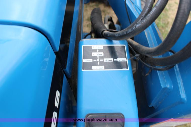 image for item F7608 1998 New Holland 1920 MFWD compact utility tractor