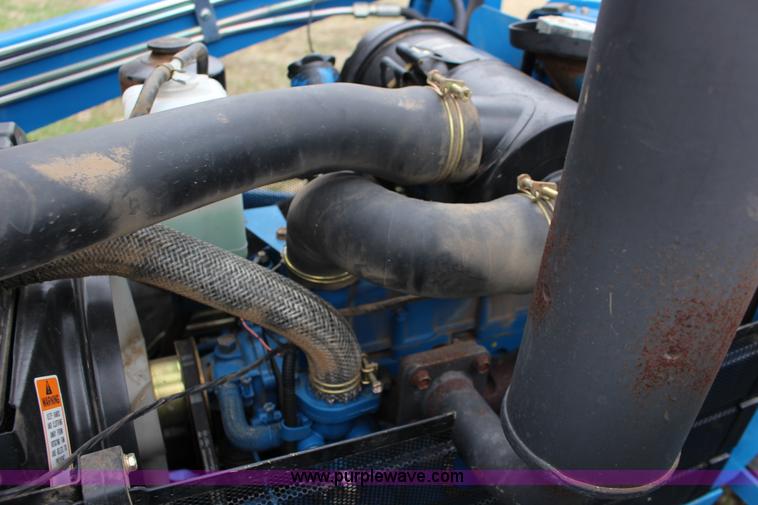 image for item F7608 1998 New Holland 1920 MFWD compact utility tractor