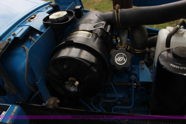 image for item F7608 1998 New Holland 1920 MFWD compact utility tractor