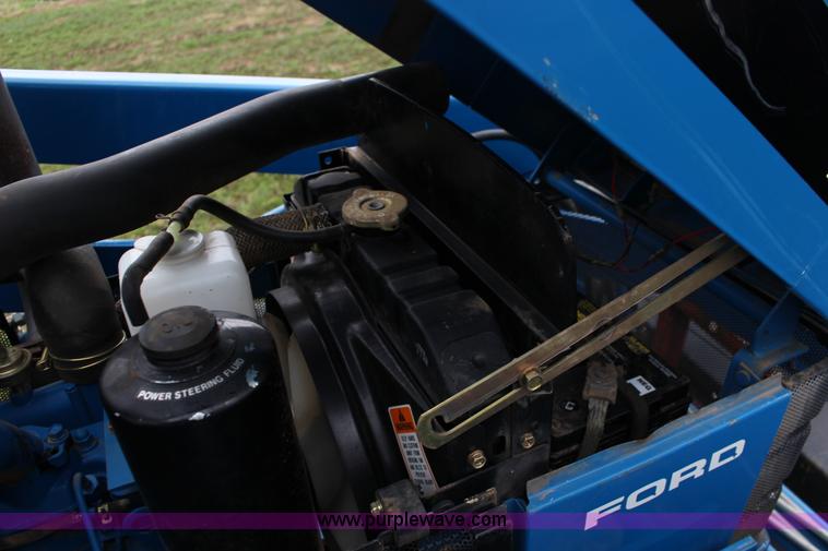 image for item F7608 1998 New Holland 1920 MFWD compact utility tractor