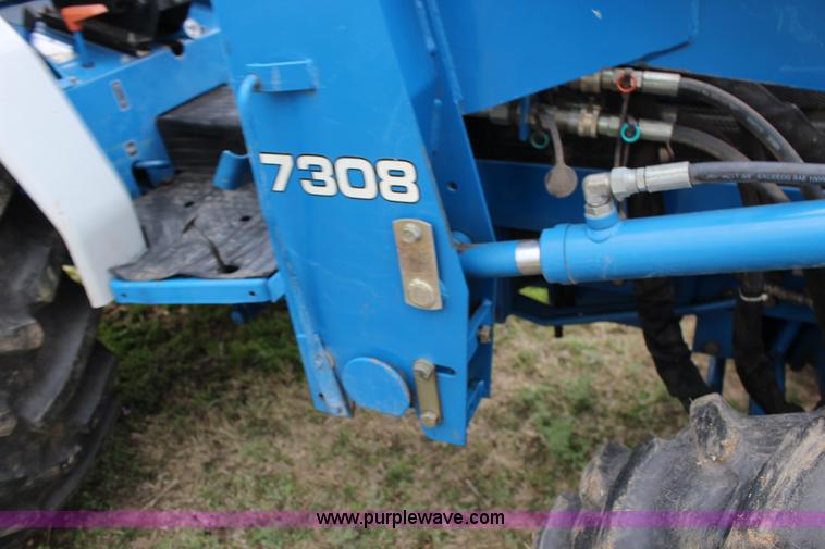 image for item F7608 1998 New Holland 1920 MFWD compact utility tractor