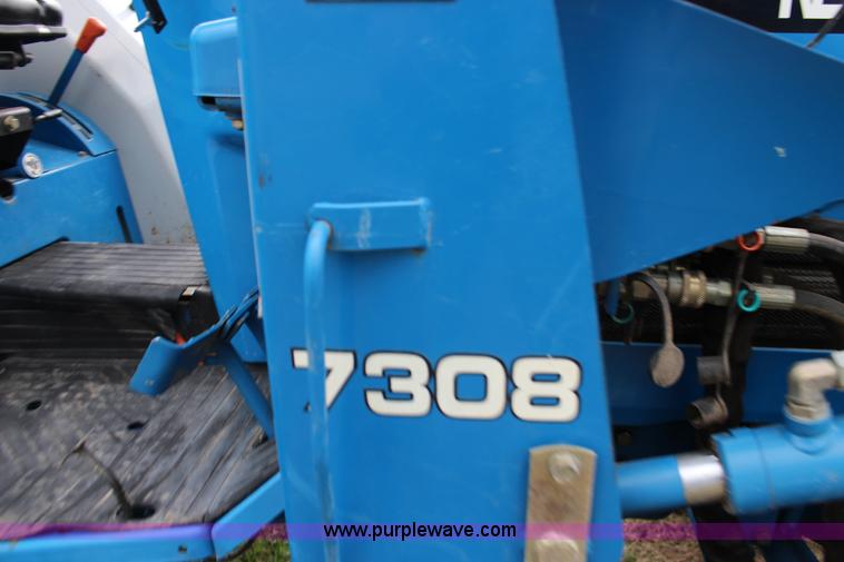 image for item F7608 1998 New Holland 1920 MFWD compact utility tractor