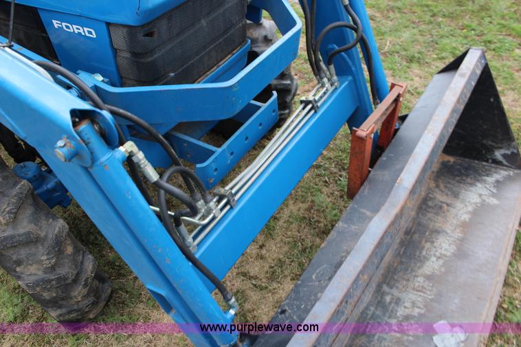 image for item F7608 1998 New Holland 1920 MFWD compact utility tractor