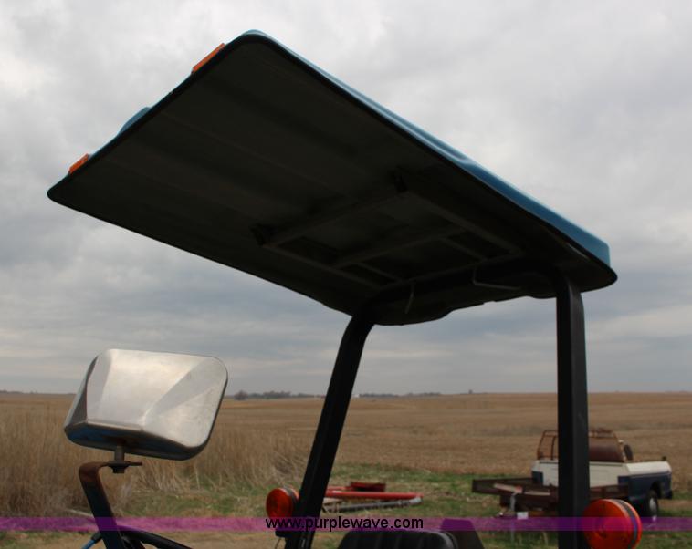 image for item F7608 1998 New Holland 1920 MFWD compact utility tractor