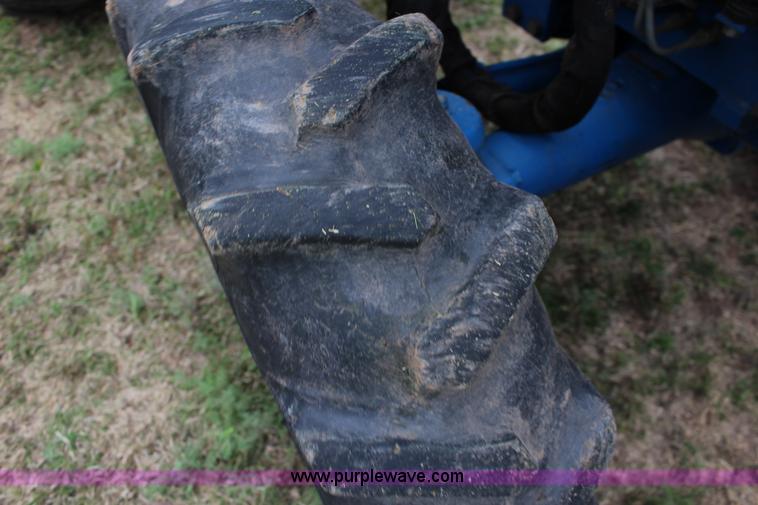 image for item F7608 1998 New Holland 1920 MFWD compact utility tractor