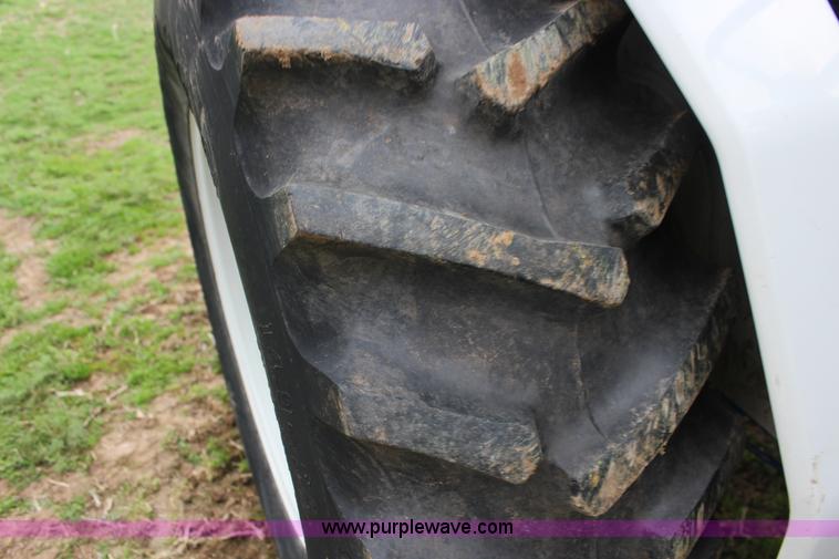 image for item F7608 1998 New Holland 1920 MFWD compact utility tractor