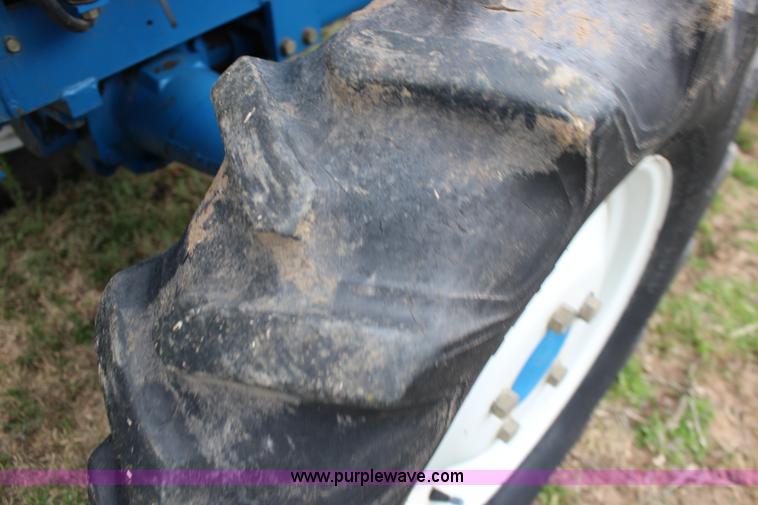 image for item F7608 1998 New Holland 1920 MFWD compact utility tractor