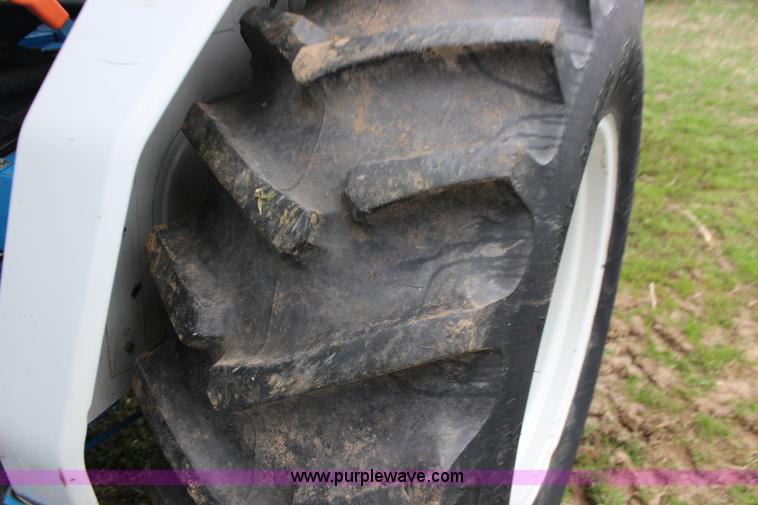 image for item F7608 1998 New Holland 1920 MFWD compact utility tractor