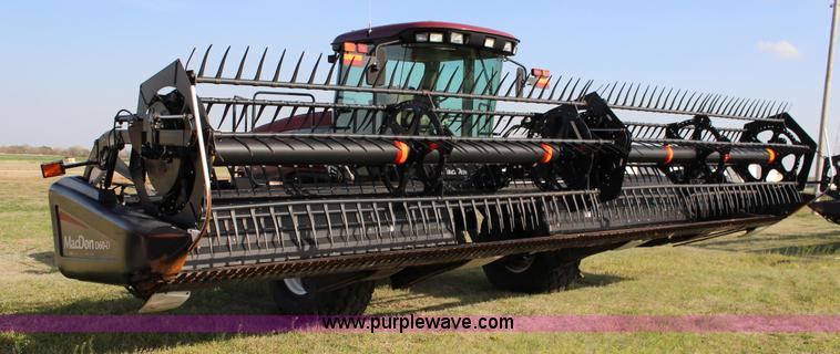 image for item F7654 2008 MacDon M150 self-propelled windrower
