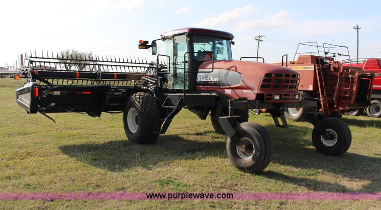 image for item F7654 2008 MacDon M150 self-propelled windrower