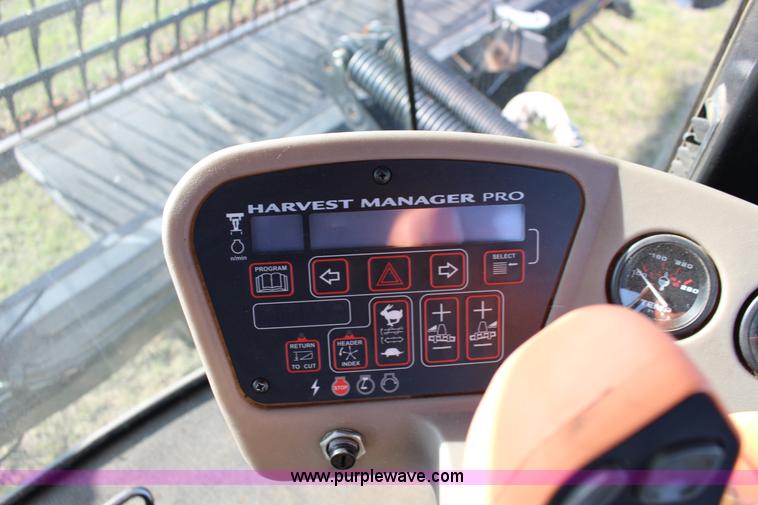 image for item F7654 2008 MacDon M150 self-propelled windrower