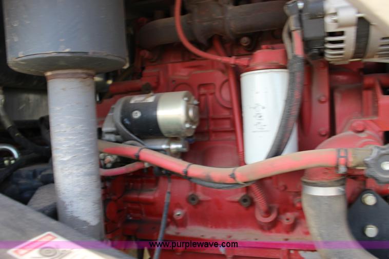 image for item F7654 2008 MacDon M150 self-propelled windrower