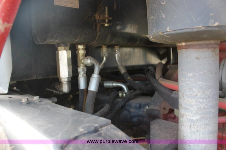 image for item F7654 2008 MacDon M150 self-propelled windrower