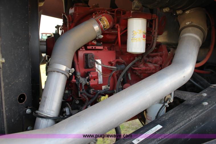 image for item F7654 2008 MacDon M150 self-propelled windrower