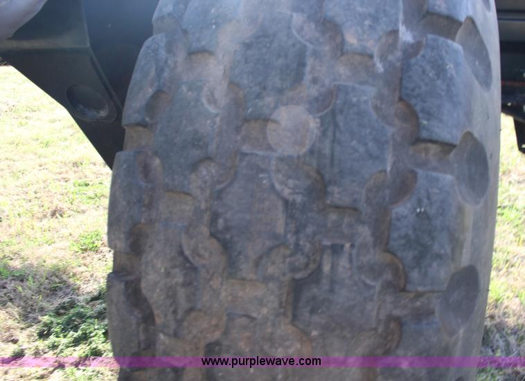 image for item F7654 2008 MacDon M150 self-propelled windrower