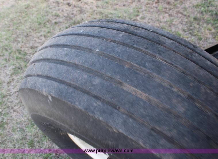 image for item F7654 2008 MacDon M150 self-propelled windrower