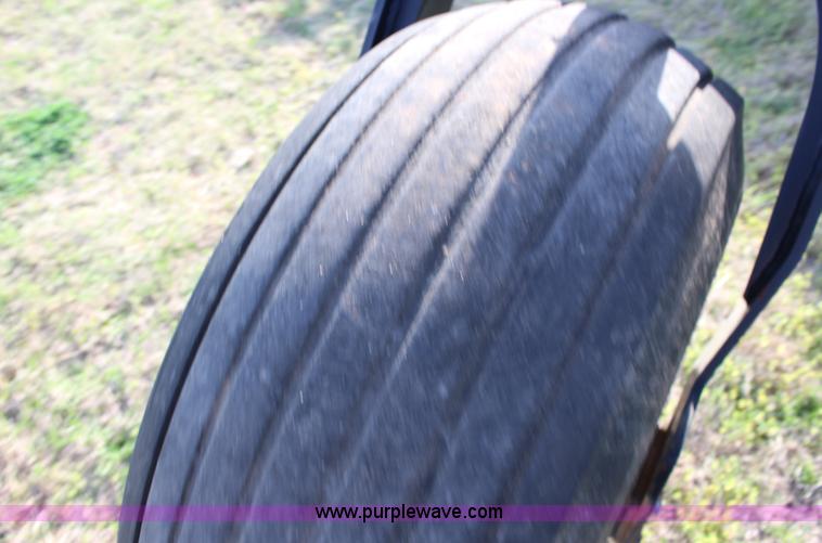 image for item F7654 2008 MacDon M150 self-propelled windrower