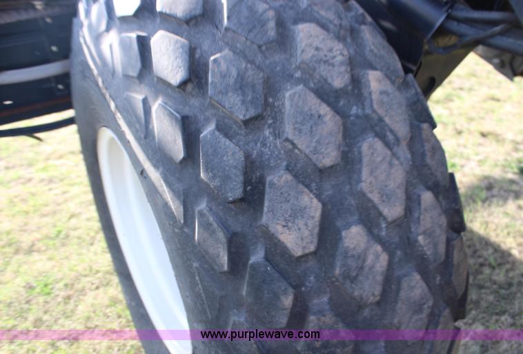 image for item F7654 2008 MacDon M150 self-propelled windrower