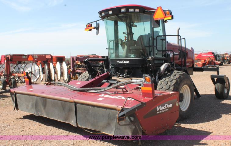 image for item H1559 2012 MacDon M205 self-propelled windrower