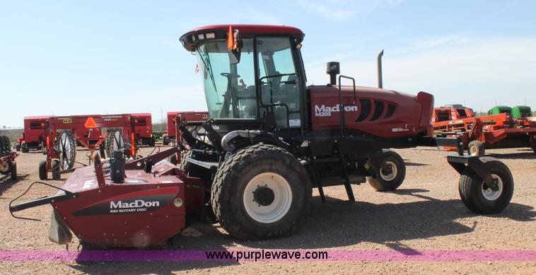 image for item H1559 2012 MacDon M205 self-propelled windrower