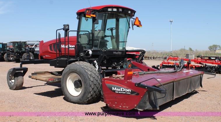 image for item H1559 2012 MacDon M205 self-propelled windrower