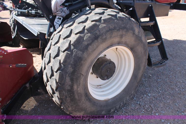 image for item H1559 2012 MacDon M205 self-propelled windrower