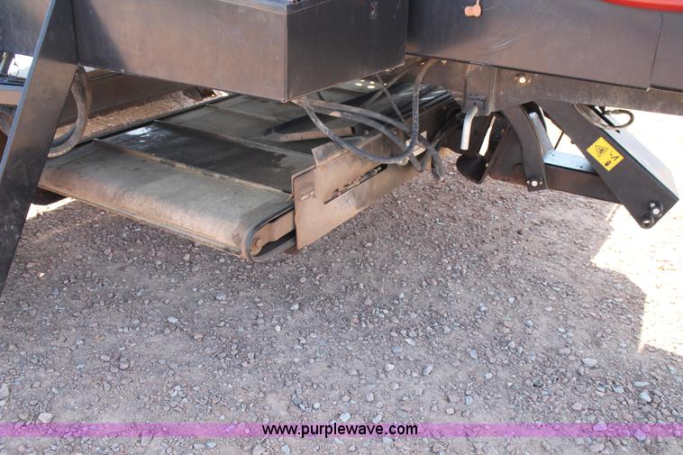 image for item H1559 2012 MacDon M205 self-propelled windrower