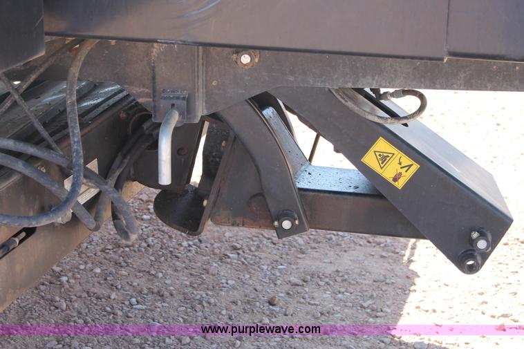 image for item H1559 2012 MacDon M205 self-propelled windrower